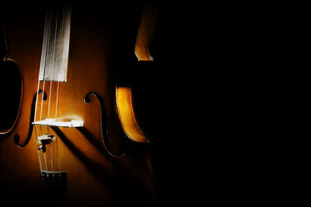Cello close up orchestra musical instruments isolated on black backgroundの写真素材