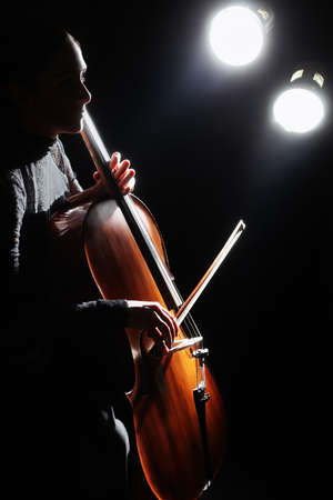 Cello player cellist playing violoncello concert. Classical musicians with musical instrumentsの写真素材