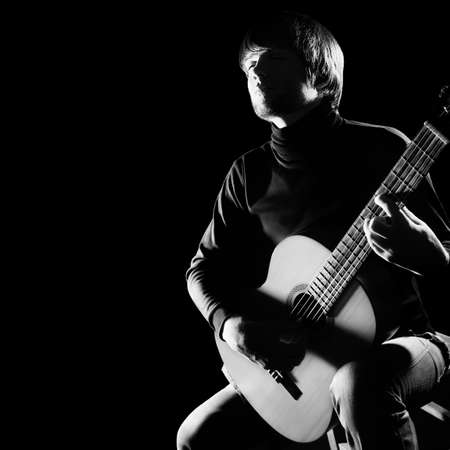 Acoustic guitar player Guitarist playing classical guitar. Man with musical instrumentの写真素材