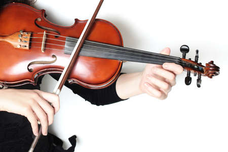 Violin player hands. Violinist playing violin close up