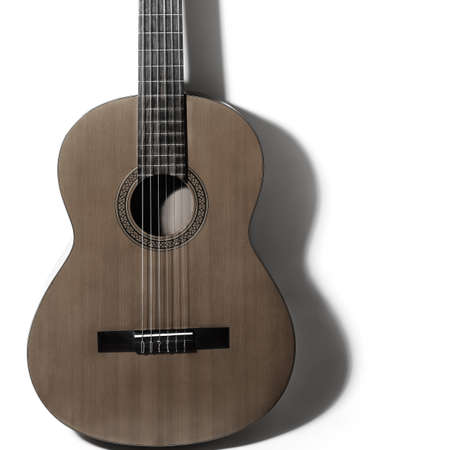 Acoustic guitar classical guitar close up on white background. Musical instruments closeupの写真素材