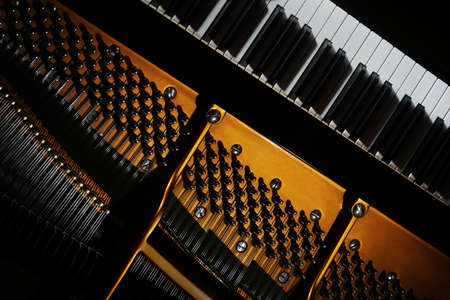 Grand piano strings keyboard close up. Piano closeup music instrumentの写真素材