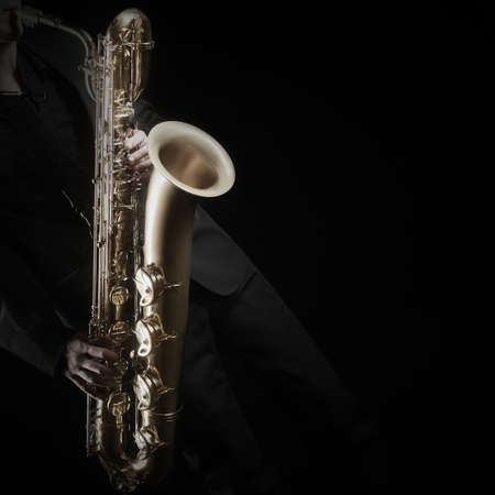 Saxophone Player Saxophonist jazz man with Sax baritone Jazz Musician hands closeupの写真素材