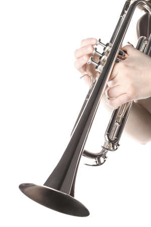 Trumpet player hands. Trumpeter isolated on white. Brass musical instrumentの写真素材