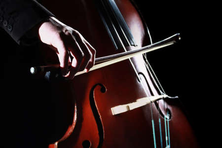 Double bass player Hands playing contrabass musical instrumentの写真素材