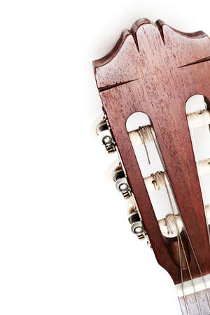 Acoustic guitar head. Classical guitar close up isolated on white backgroundの写真素材