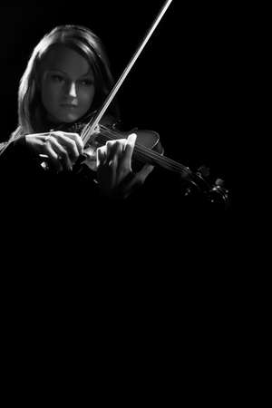Violin player. Violinist classical musician playing orchestra music instrumentの写真素材