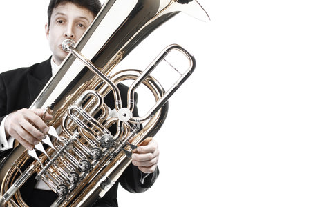 Tuba player brass instruments. Classical musician playing euphonium music instrument. Orchesral bassの写真素材