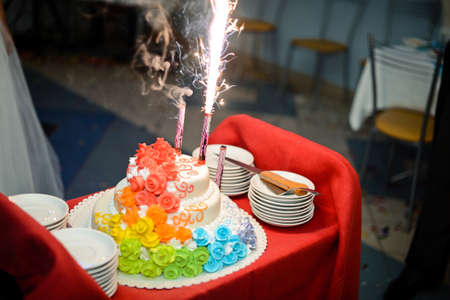 Beautiful big pie with fireworks on a tray.の写真素材
