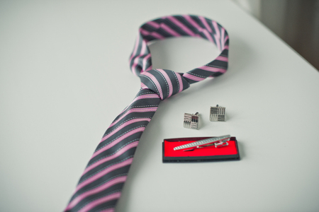 Asseksuara of the groom before wedding: tie, cuff links fastener.の写真素材