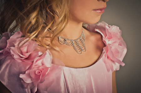 Beautiful children's dress and ornaments on the child.の写真素材