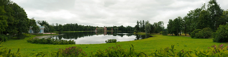 Panoramic view on the lake in Catherine Park of Tsarskoye Selo about the city of St. Petersburg, Russia.の写真素材