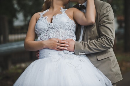 The young man embraces the woman.の写真素材