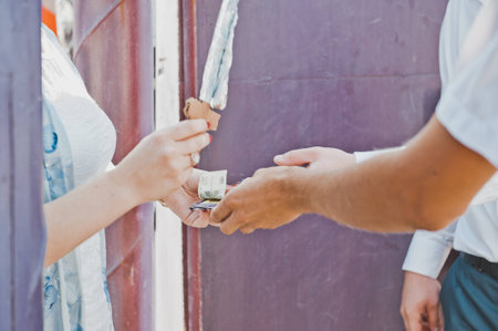 Hands of the girl and guy.の写真素材