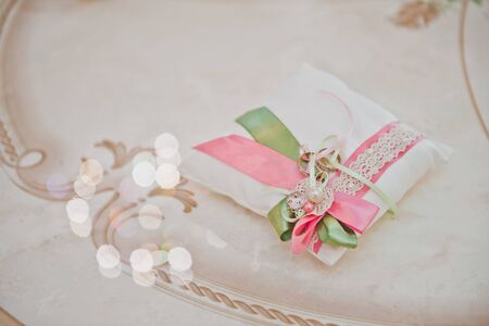 Wedding rings on a table.の写真素材