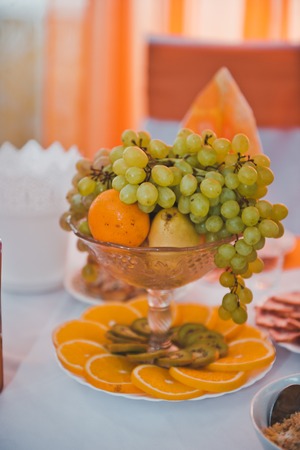 Fruit lies in a dish.の写真素材