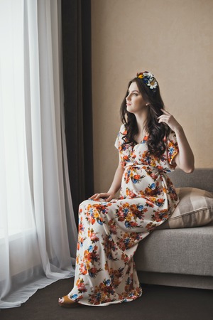 The girl during pregnancy in a beautiful dress.の写真素材