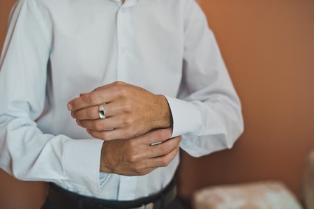 Process of clothing of a shirt.の写真素材