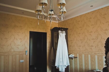 White dress on a hanger.の写真素材