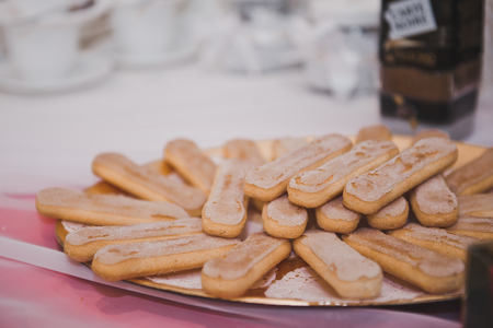 Table with candies and tea.の写真素材