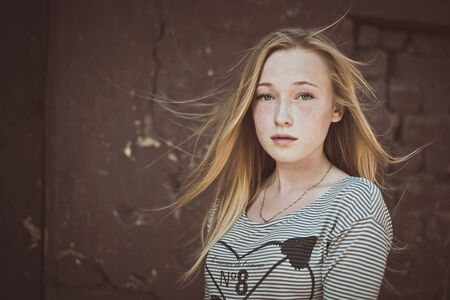 Large portrait of the freckled girl.の写真素材