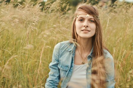 Portrait of the girl in the field.の写真素材
