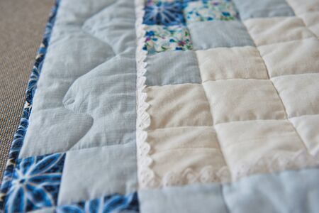 Blanket made manually from fabric slices.の写真素材