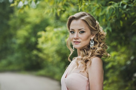 Large portrait of the girl with a beautiful hairdress.の写真素材
