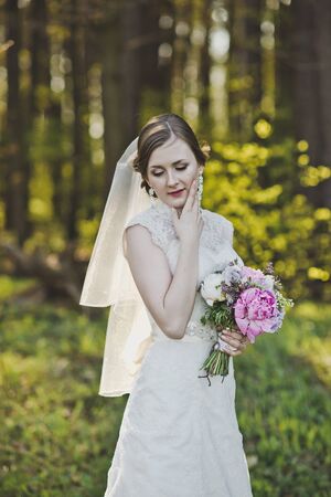 Portrait of a girl in a wedding dress and veil.の写真素材
