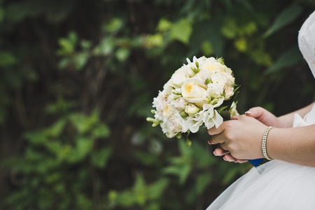 Bouquet in the hands of the bride.の写真素材