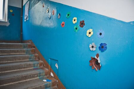 Paper flowers on the wall.の写真素材