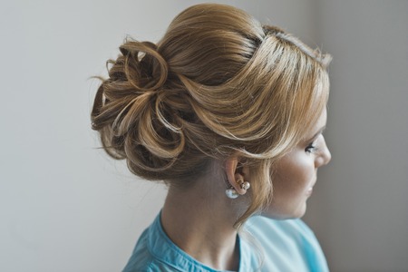A side view of a beautiful hairstyle.