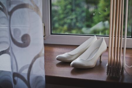 White shoes on the windowsill.の写真素材