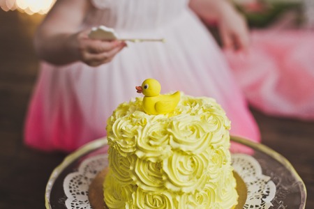 Little kid eats cake.の写真素材