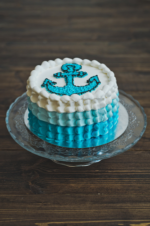 A cake with an anchor for the child.の写真素材
