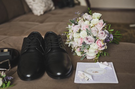 Elements of the male wardrobe on the bed.の写真素材