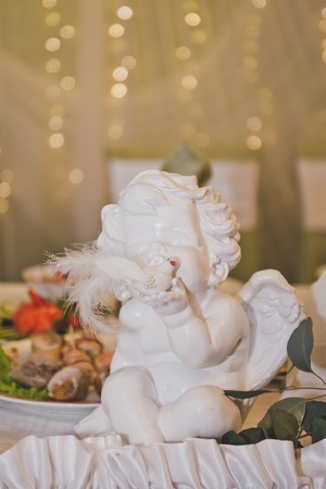 Plaster statuette of an angel as decoration.の写真素材