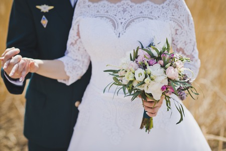 Military embraces his bride.の写真素材