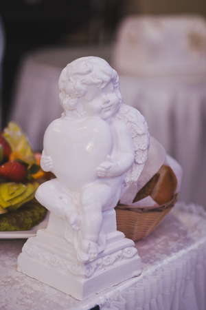 Angel figurine as a table decoration.の写真素材
