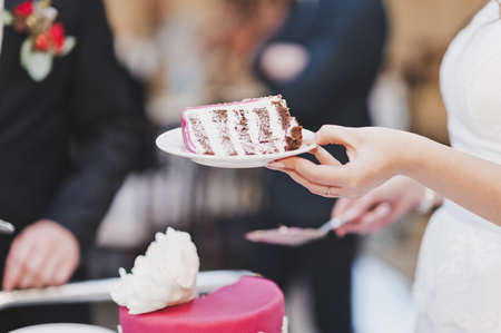 The division into parts of the wedding cake.の写真素材