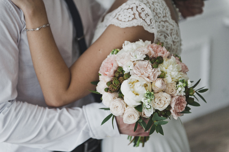 The gentle embrace of a man and a woman.の写真素材