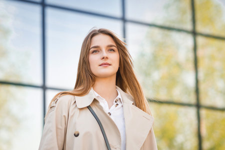 Portrait of a business lady on the background of an office building.の写真素材