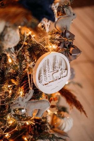 Carved Christmas tree toy in the form of a wooden star.の写真素材