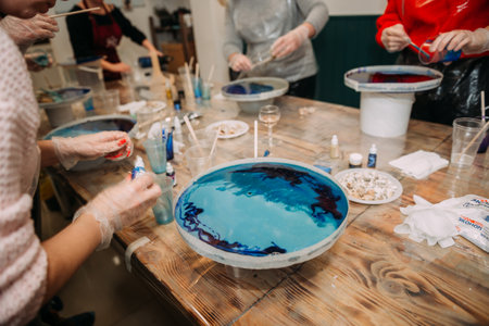 Working with epoxy resin when creating decorative products.の写真素材