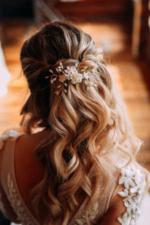 A large photo of the brides chic hairstyle.