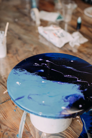 Creating a wave pattern in epoxy resin with a hair dryer.の写真素材