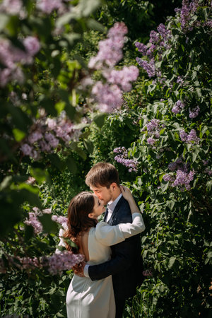 It exudes a romantic and tender atmosphere, likely capturing a moment from a wedding or a love-filled occasion.の写真素材
