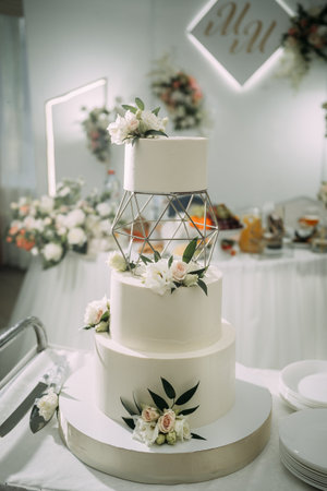 The image is a white cake with flowers on it.の写真素材