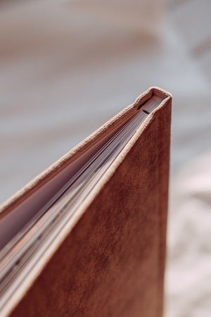 It is a stationary item with a binding, similar to a file folder.