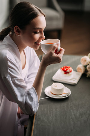 The woman appears to be young and is dressed for a wedding or special occasion.の写真素材